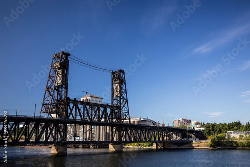 USA, Oregon, Portland. Steel Bridge spans the Willamette River and was opened in 1912.