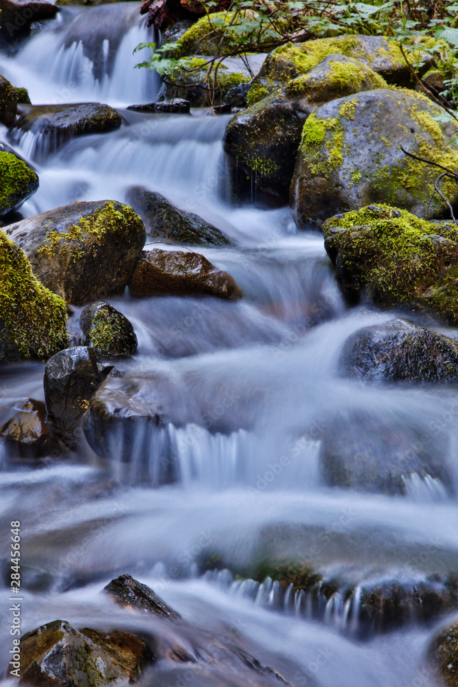 USA, Oregon, Columbia River Gorge, Water Cascading over Rocks at Punchbowl Falls USA, Oregon, Columbia River Gorge, Water Cascading over Rocks at Punchbowl Falls