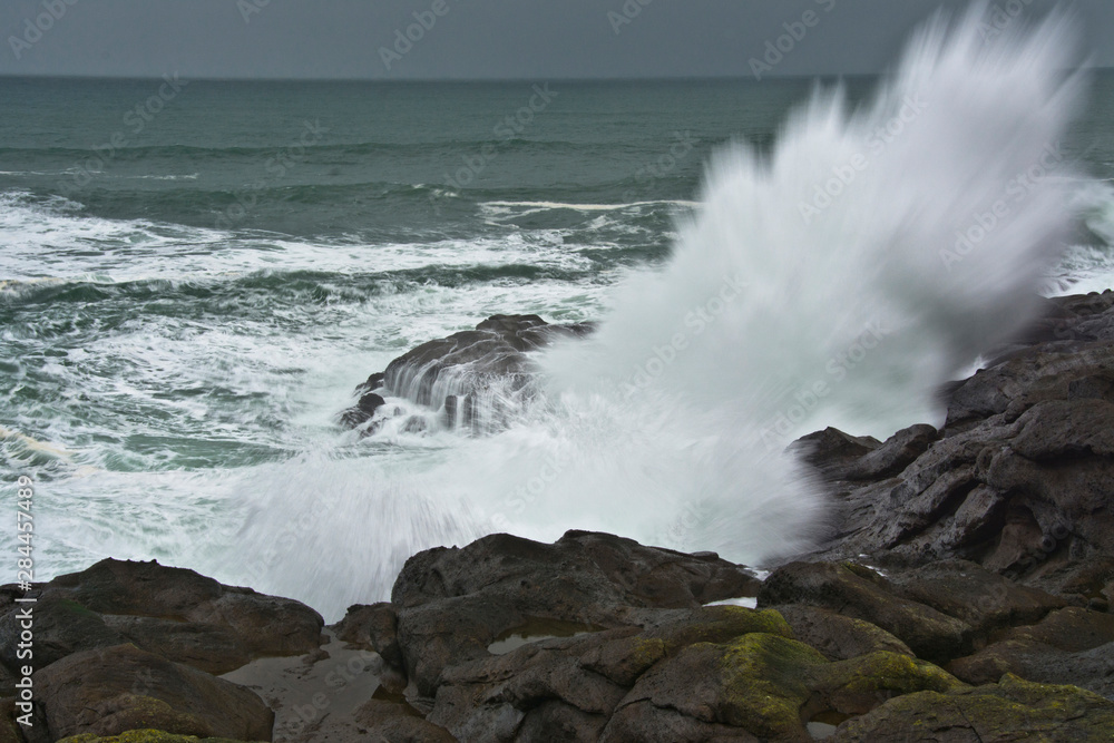 High surf, spray, rocks, ocean, Depoe Bay, Oregon, USA