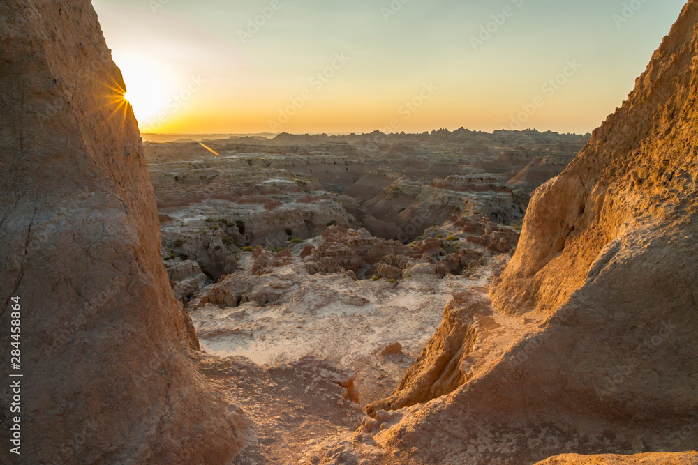 USA, South Dakota, Badlands National Park. Sunrise over eroded formations. Credit as: Cathy & Gordon Illg / Jaynes Gallery / DanitaDelimont.com