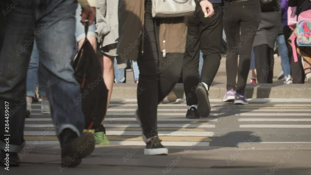Busy city street people on zebra crossing. Busy city street people on zebra crossing.