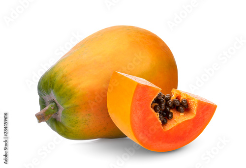 fresh ripe papaya with slices isolated on white background