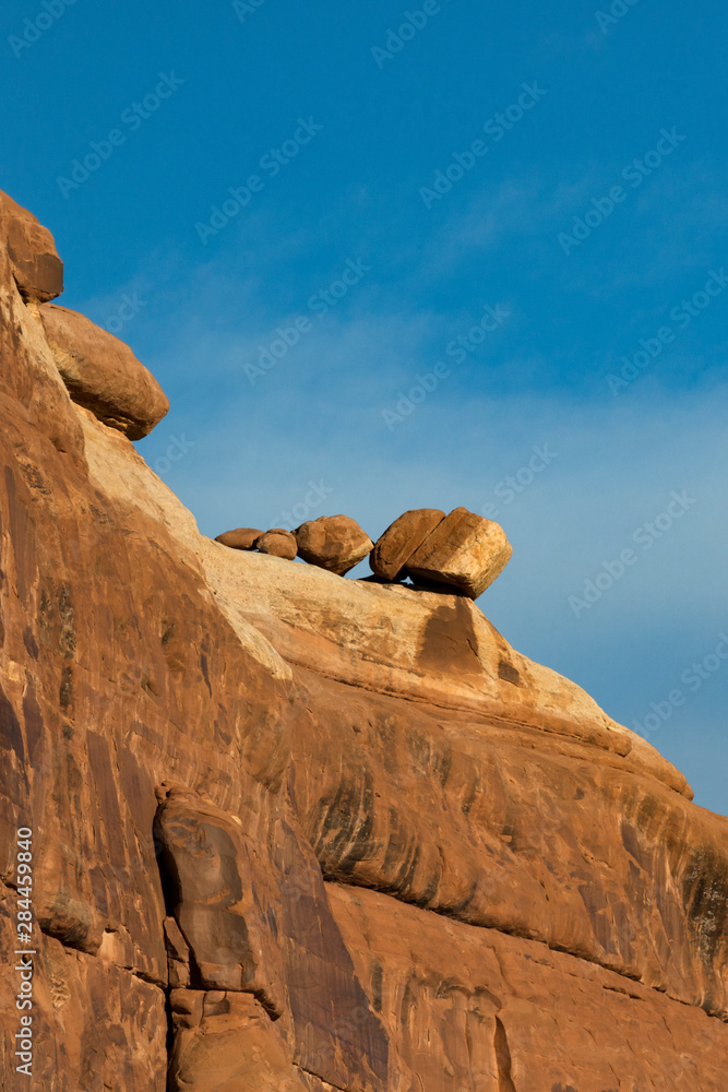 USA, Utah. The Three Bears rock formation balanced on edge of cliff