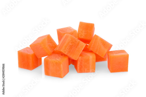 sweet carrot cubes isolated on the white background