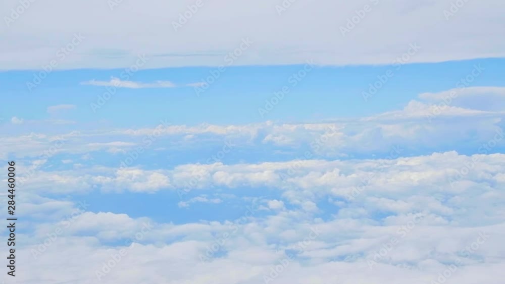 Blue sky and white clouds at an altitude of 10,000 meters Blue sky and white clouds at an altitude of 10,000 meters