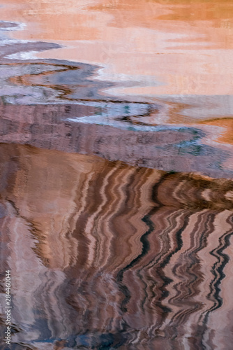 USA, Utah, Glen Canyon National Recreation Area. Abstract design of canyon wall and sky reflections.