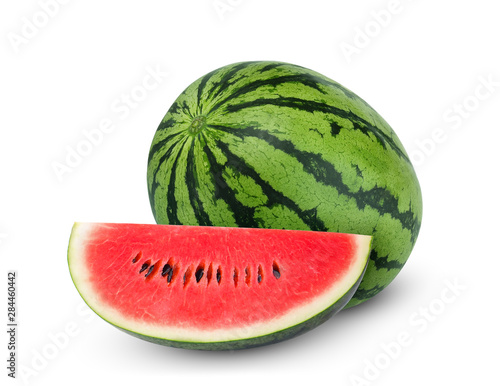 whole and sliced watermelon isolated on white background