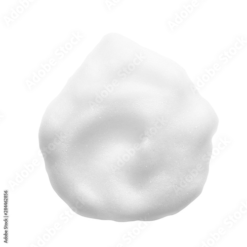 White cleanser foam texture isolated on white background. Cosmetic mousse, soap, shampoo suds photo