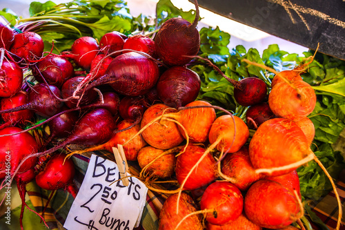 Port Angeles, Washington State, Farmers Market, Bunches of fresh orange and red beets photo