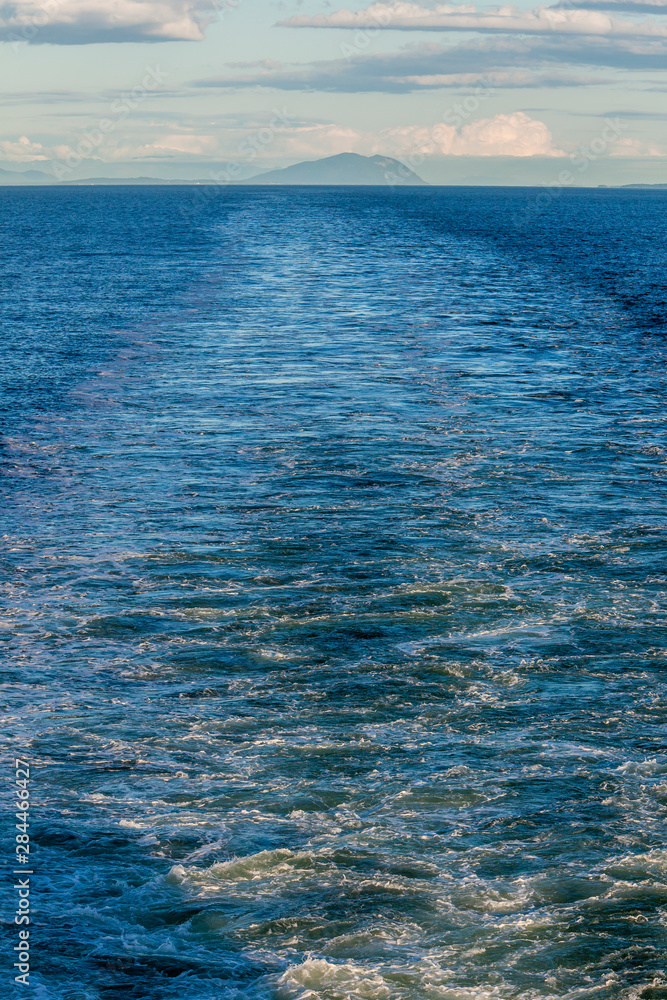 Obraz premium USA, Washington State. Wake from an AMHS ferry departing on the Inside Passage to Alaska
