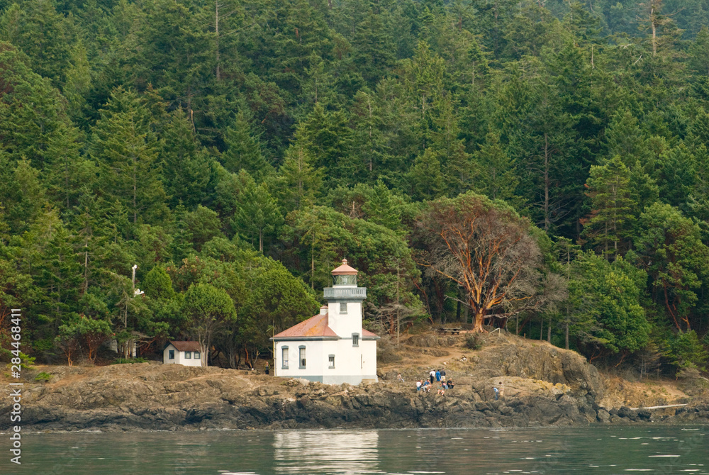 USA, WA, San Juan Islands. Lime Kiln Lighthouse is an active navigational aid located in Lime Kiln Point Park. Favored spot for viewing Orcas in Haro Strait.