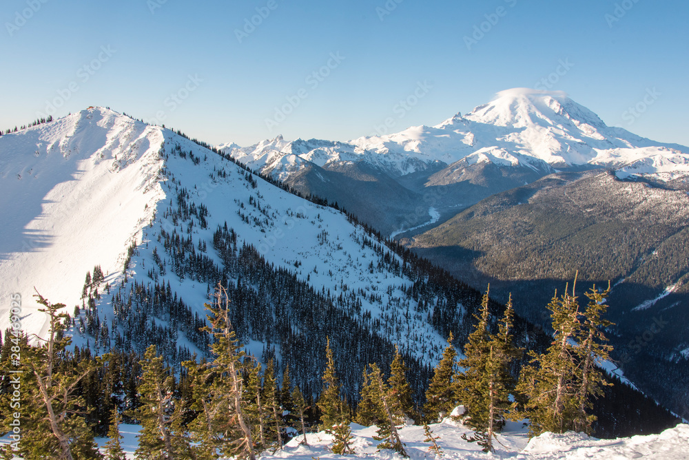 USA, Washington State. Crystal Mountain Resort. Mt. Rainier with cap cloud in morning. Expansive views from summit reached by gondola ride