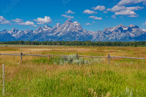 USA, Wyoming. Grazing Land with a backdrop of the Grand Teton Mountains Credit as: Jean Carter / Jaynes Gallery / DanitaDelimont.com