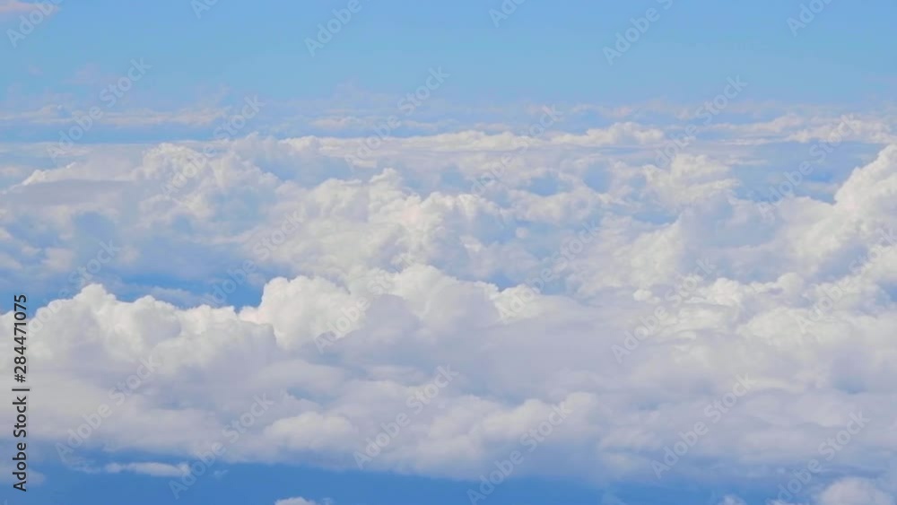Blue sky and white clouds at an altitude of 10,000 meters Blue sky and white clouds at an altitude of 10,000 meters