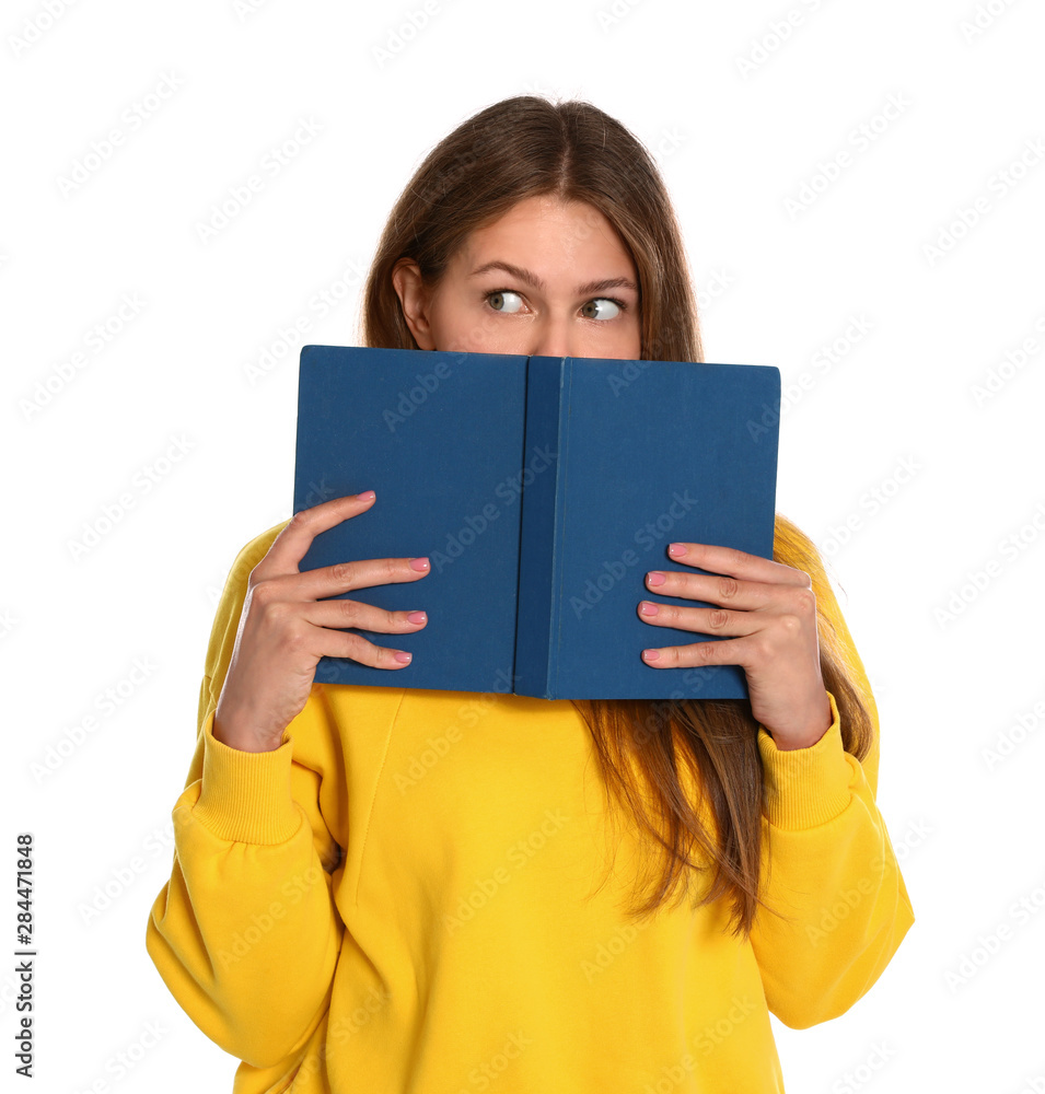 Beautiful young woman with book on white background. Reading time