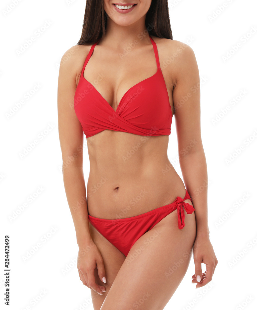 Pretty sexy woman with slim body in stylish red bikini on white background, closeup view Pretty sexy woman with slim body in stylish red bikini on white background, closeup view