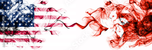 United States of America vs Hong Kong, China smoky mystic flags placed side by side. Thick colored silky abstract smokes banner of America and Hong Kong, China photo