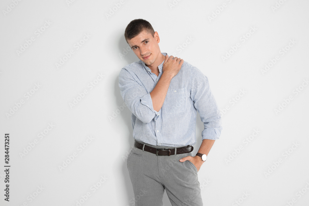 Portrait of handsome young man on light background Portrait of handsome young man on light background