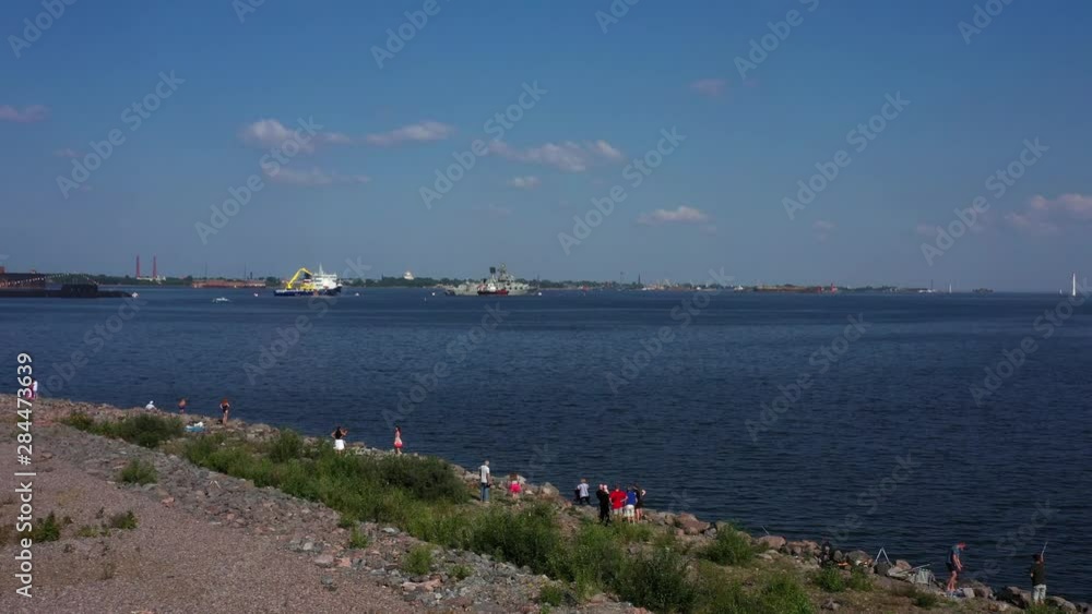 View of three marine vessles from bank View of three marine vessles from bank