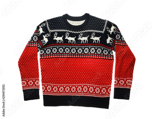 Warm red Christmas sweater on white background, top view photo