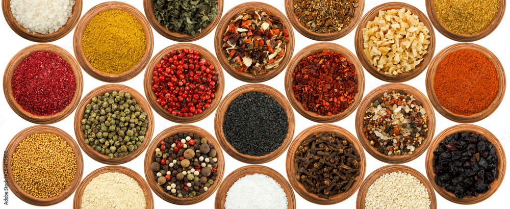 The texture of spices. Seasoning panel. View from above. Seasoning in cups. The texture of spices. Seasoning panel. View from above. Seasoning in cups.