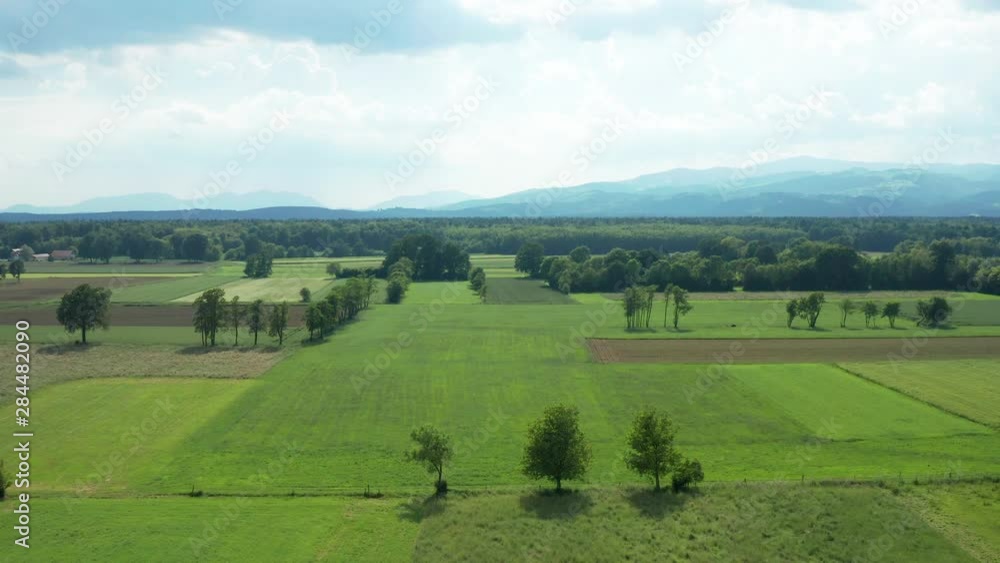 Aerial flyby looking down view of a beautiful rural European countryside Aerial flyby looking down view of a beautiful rural European countryside