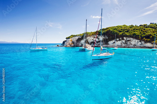Fototapeta Naklejka Na Ścianę i Meble -  Beautiful bay with sailing boats yachts near the Paxos island, Greece
