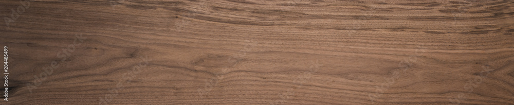 Black walnut wood texture of solid board untreated Black walnut wood texture of solid board untreated