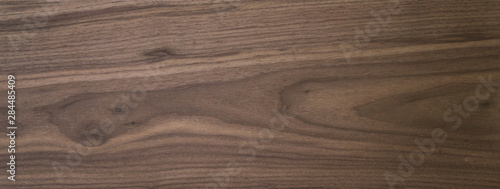 Black walnut wood texture of solid board untreated