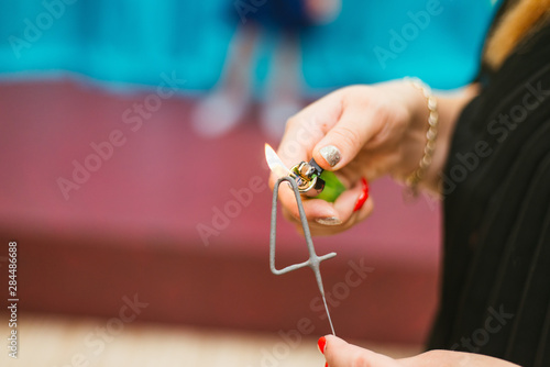 hands of woman with flare