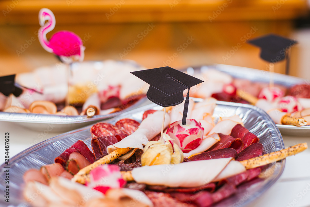 meat platter decorated with graduation cap 