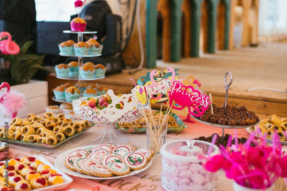 party table with sweets and party decoration