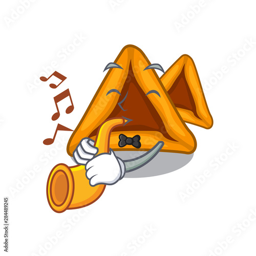 With trumpet hamantaschen cookies isolated with the mascot