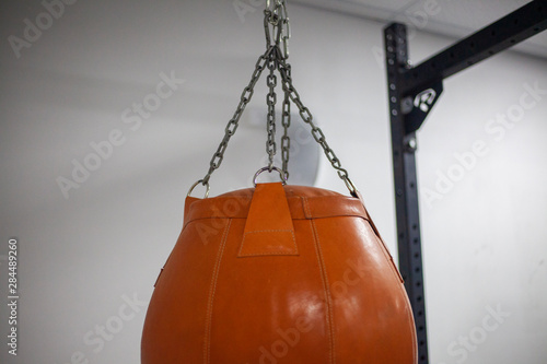 Sports punching bag. Sports equipment in the gym. The simulator for practicing blows. © Олег Копьёв