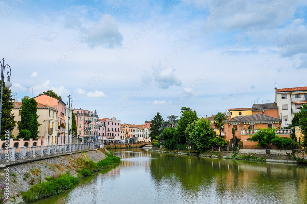 Este, Italy - July, 16, 2019: Landscape with the image of channel in Este, Italy