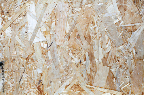 Texture of wood sawdust. The board pressed from sawdust. A wooden product.