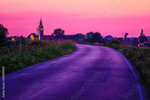 Rovigo, Italy - July, 26, 2019: landscape with the image of a road in Italy at sunset photo