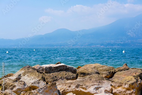 stones on a bank of Garda lake in Italy