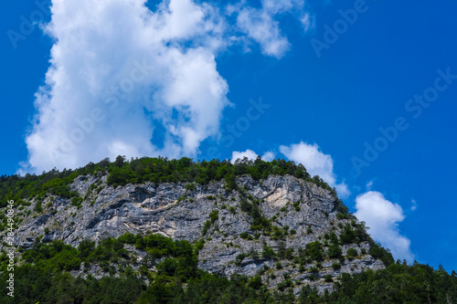 Landscape with the image of clouds under the mountain