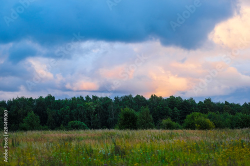 Landscape with the image of country side at sunset