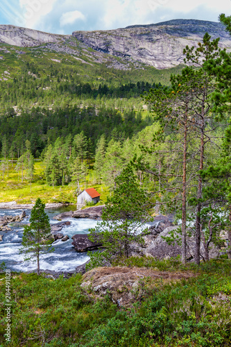 Majestic waterfall Likholefossen along National Scenic route Gaularfjellet in Norway photo