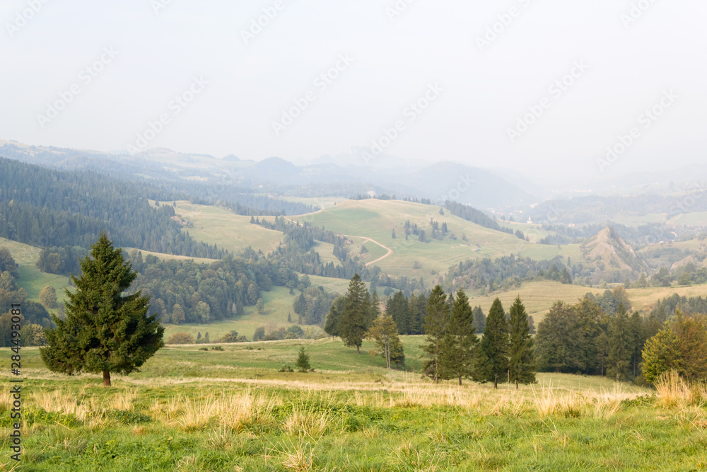 View from Hill of Valley of White Water in Little Pieniny in early autumn at sunrise, Poland