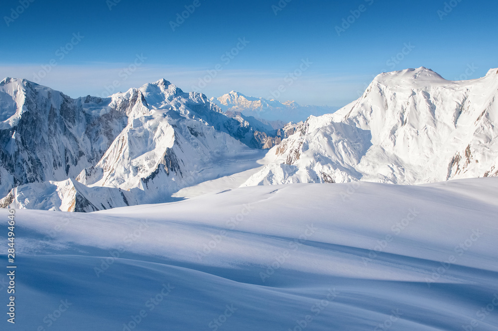 Snow covered Nanga Parbat mountains and glacier in the Karakoram mountains range 
