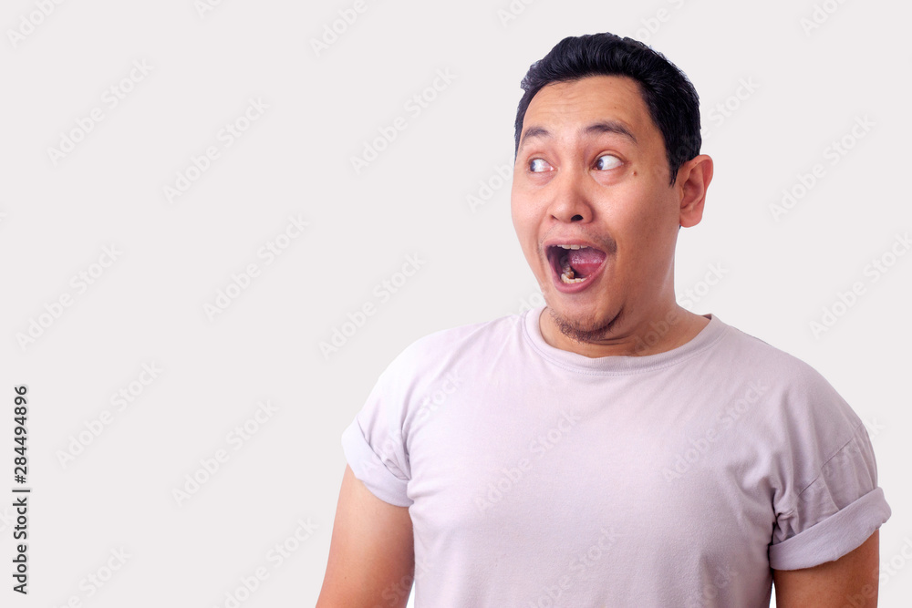 Man Shocked to See Something on his Side, Excited Gesture with Copy Space