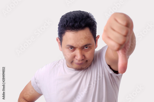 Cuadro en lienzo Young Man Showing Thumbs Down