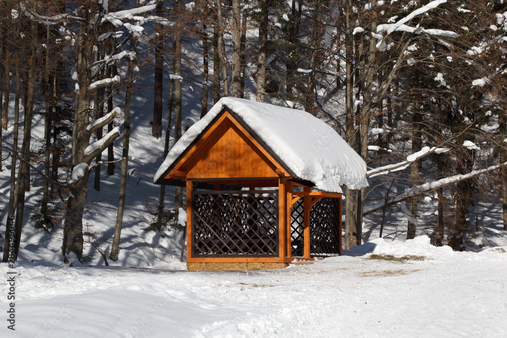 wooden house in winter forest wooden house in winter forest