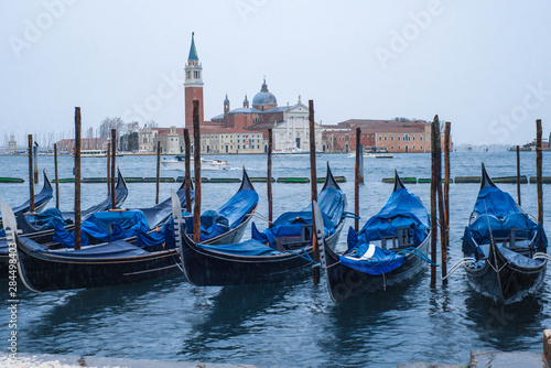 Covered parked gondolas  in Venice, Italy © zoya