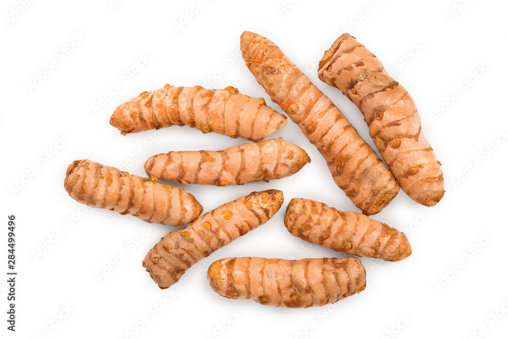 Turmeric root isolated on white background. Top view. Flat lay Turmeric root isolated on white background. Top view. Flat lay