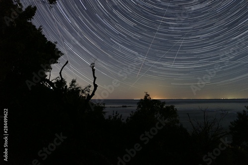 Startrails with the see in Greece