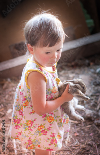 little girl with rabbit